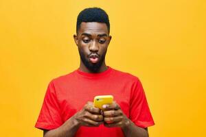 man yellow technology mobile mockup happy phone black african background screen young photo