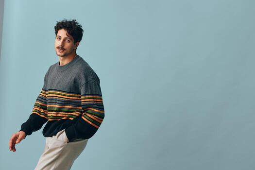 Man sweater handsome guy face fashion portrait background trendy copyspace hipster smile photo