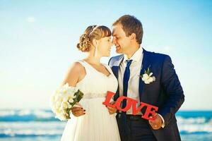 Beautiful, happy newly married couple photo