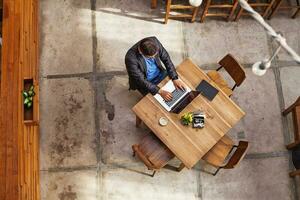 Businessman working remotely photo