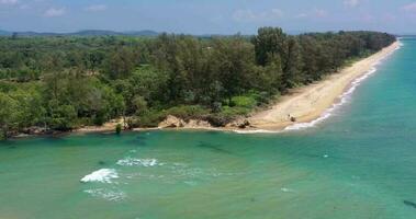 Drone video of Thai Natai Beach with mouth of Bo Dan River