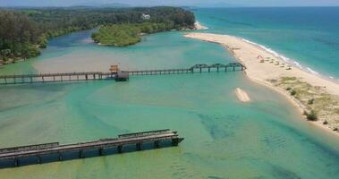 Drone video of Thai Natai Beach with mouth of Bo Dan River