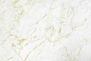 White of granite stone background with luxury mineral gold on texture photo