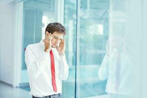 Stressed young businessman photo