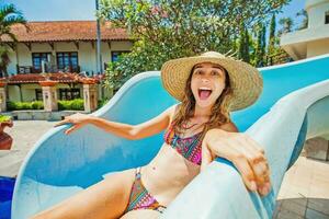 woman in a swimming pool of waterpark photo
