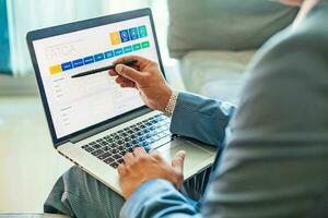 man using program for FATCA photo