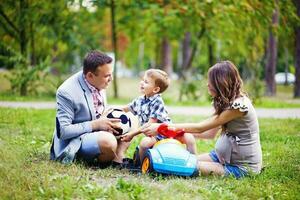 Beautiful family in the park photo