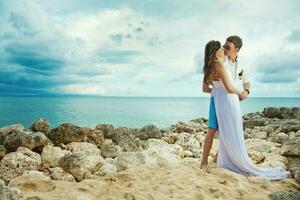 Beautiful newly married couple. Honeymoon and wedding concept photo