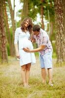 Beautiful family in the park photo