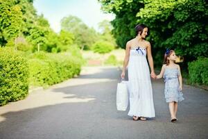 Mother and daughter in the park photo