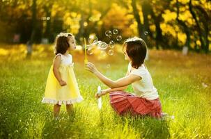 Mother and daughter in the park photo