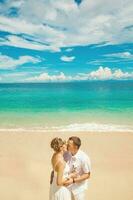 Beautiful newly married couple. Honeymoon and wedding concept photo