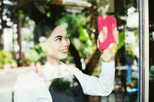 Beautiful Asian woman in the cafe photo