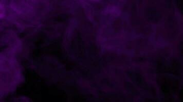 Smoke from Ultrasonic Aroma Diffuser and colorful light on black background. video