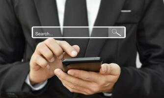 Businessman use smartphone for search page. Searching information data on internet networking. photo