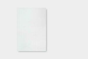 White Paper sheet isolated on white background included clipping path. Top view photo