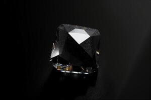 A Black Diamond On A Black Background. photo