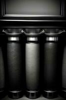 A Row Of Black And Silver Canisters Sitting Next To Each Other. AI Generated photo