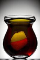 A Glass Vase With A Red And Yellow Substance In It. AI Generated photo