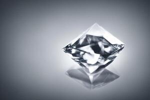 A Close Up Of A Diamond On A Reflective Surface. photo