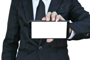 Close up of businessman hold blank screen smartphone in hand, Isolated on white background with clipping path. photo