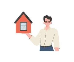 The man is depicted waist-deep holding a house in his hands. Real estate sale concept. Isolated. Vector illustration.