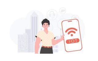 IOT and automation concept. A man holds a phone with the IoT logo in his hands. Trendy flat style. Vector illustration.