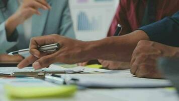 Corporate business team and manager in a meeting, close up video