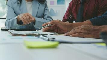 Corporate business team and manager in a meeting, close up video