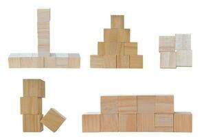 Collection of different wood toy cubes isolated on white background. Object with clipping path. photo