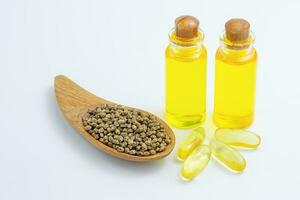 CBD cannabis oil. Hemp oil and  hemp seed isolated on white background. Healthy cannabis oil. photo