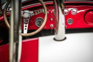 Classic Car Dashboard and Steering Wheel photo