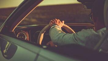 Summer Road Trip Behind a Convertible Car Wheel photo