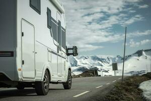 RV Camper Van Motor Home on a Scenic Norwegian Mountain Route photo