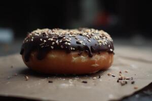 Chocolate donut with sprinkles. photo