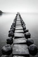 puente hecho de piedras con vista a el horizonte, negro y blanco. ai generativo foto