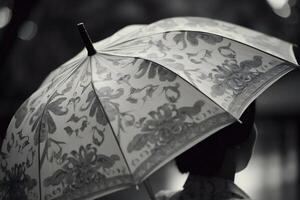 elegancia en el lluvia, un persona con un estampado sombrilla. ai generativo foto