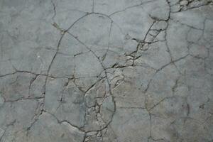 a close up of a concrete surface photo