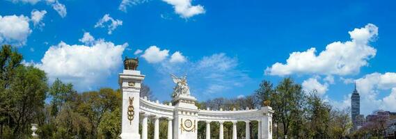 Landmark Benito Juarez Monument and city center at Mexico City Alameda Central Park photo