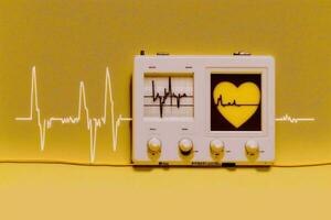 Heart monitor measuring vital signs, medical technology. photo