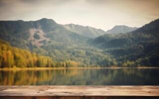 Empty wooden table decorated with meadow blurred lake and mountain view background. . photo