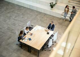 Aerial view at young startup team working in the office photo