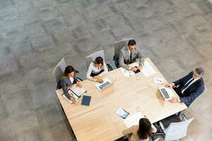 Aerial view at young startup team working in the office photo