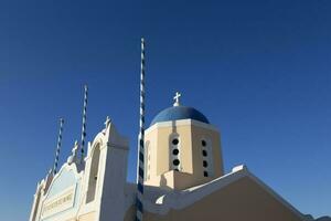 Saint Dimitrios Oia Holy Orthodox Church on Santorini island, Greece photo