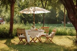 Cafe table with chair and parasol umbrella in the garden. photo