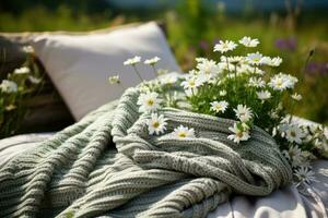 Picnic blanket and spring daisy flowers. Generative AI photo