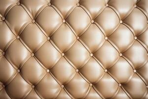 Textured background sofa in beige tones. photo