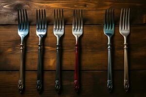 Antique fork on a wooden table. Generative AI photo