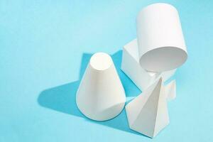 top view of different paper geometric solids photo