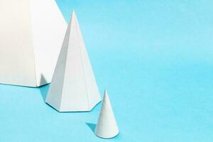 handmade different paper cone and pyramids closeup photo